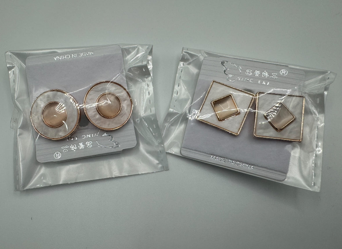 Unique silver and rose gold stud earrings
