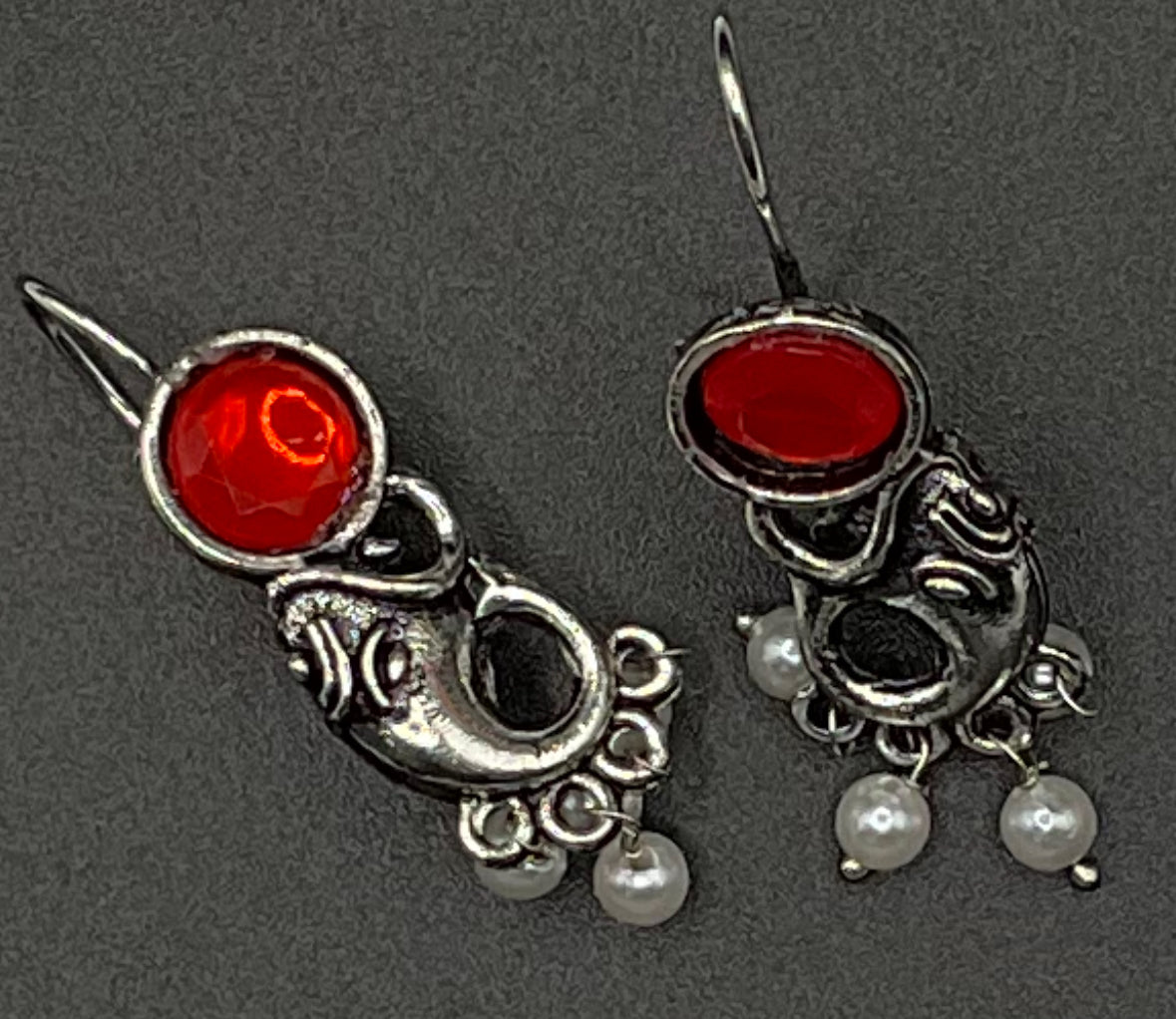 Lightweight and unique Ganpati oxidized stone earrings with pearls