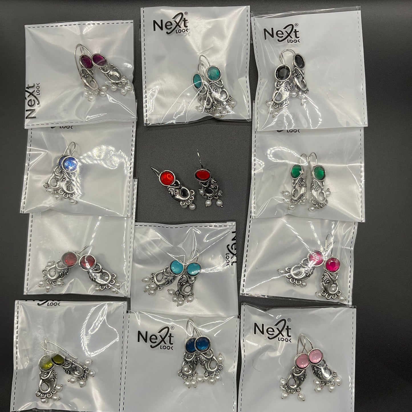 Lightweight and unique Ganpati oxidized stone earrings with pearls